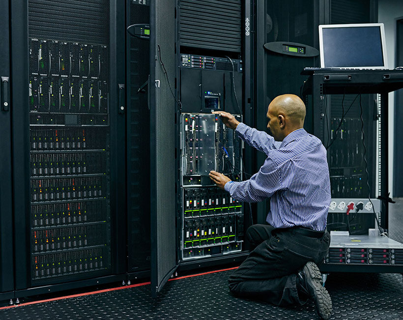 Network engineer upgrading server hardware to enhance IT capabilities.