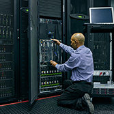 IT professional performing network maintenance